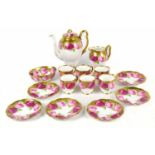 ROYAL ALBERT; a six setting tea service decorated with roses with gilt highlights.Good condition