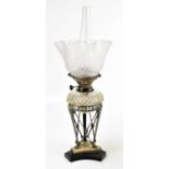 M & S; an Edward VII hallmarked silver oil lamp, the frosted glass shade with lace work style
