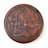 A 19th century French burr wood snuff box of circular form embossed with figures on horseback,