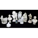 A group of seven 19th century Parian figure groups to include Queen Victoria, a boy upon a pedestal,