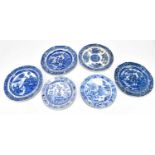 Six 19th century Pearlware and ceramic blue and white plates to include an example by G Harrison