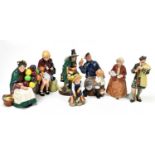 ROYAL DOULTON; a collection of seven ceramic figures comprising 'The Old Balloon Seller' HN1315, '