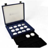 WESTMINISTER COINS; a collection of fourteen Pope John-Paul II coin collection silver proof coins,