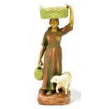 AMPHORA; an Art Nouveau figure representing a Dutch girl supporting a basket above her head