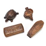 Four treen snuff boxes including two novelty examples, the first in the form of a tortoise with