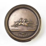 A 19th century silver plated and lacquered snuff box of circular form, embossed with jockeys on