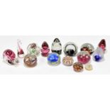 A collection of assorted paperweights including Strathearn examples, animal form examples, etc.