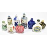 Nine modern and decorative Chinese porcelain and ceramic snuff boxes to include a Famille Rose