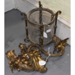 A gilt metal Rococo style two branch wall light, height 22cm, and a small circular brass framed hall