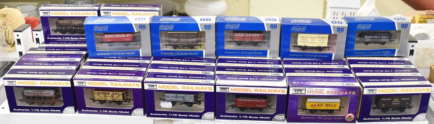 DAPOL; a large collection of boxed 1:76 scale model railway rolling stock.
