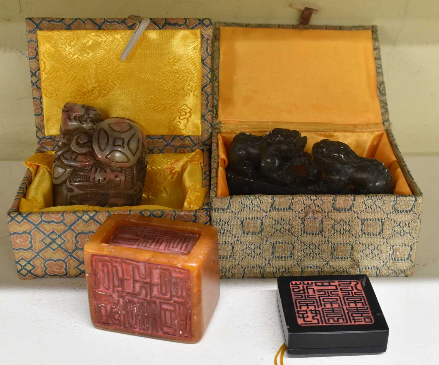 Four assorted Chinese hardstone seals.