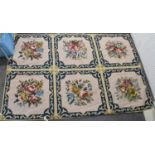 An Aubusson style woollen rug decorated with six floral panels, 195 x 131cm.