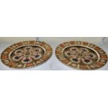 A pair of Royal Crown Derby Imari pattern plates, no.1128, diameter 25.5cm.