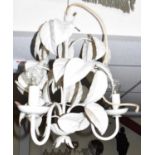 Two wrought iron ceiling lights of floral form, also a reproduction Tiffany style shade (3).