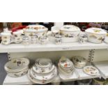 Two shelves of Royal Worcester tableware, Evesham, etc. Location: shelves 37 and 38