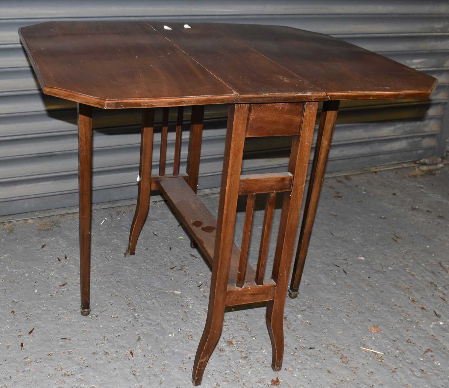 An early 20th century mahogany Sutherland occasional table, width 65.5cm.