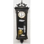 A late Victorian ebonised single weight Vienna wall clock, height 120cm.