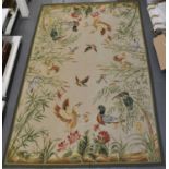 A large Aubusson style tapestry rug decorated with various birds amongst foliage, 272 x 179cm.