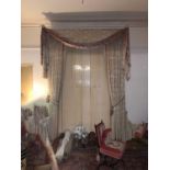 Three pair of curtains with drops, various other curtains, and a basket containing a large