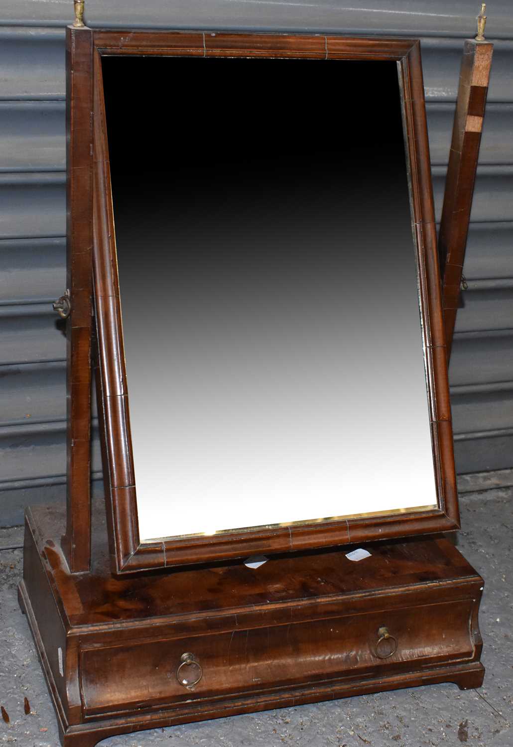 A 19th century yew wood toilet mirror with rectangular swing frame, bone finials and crossbanded