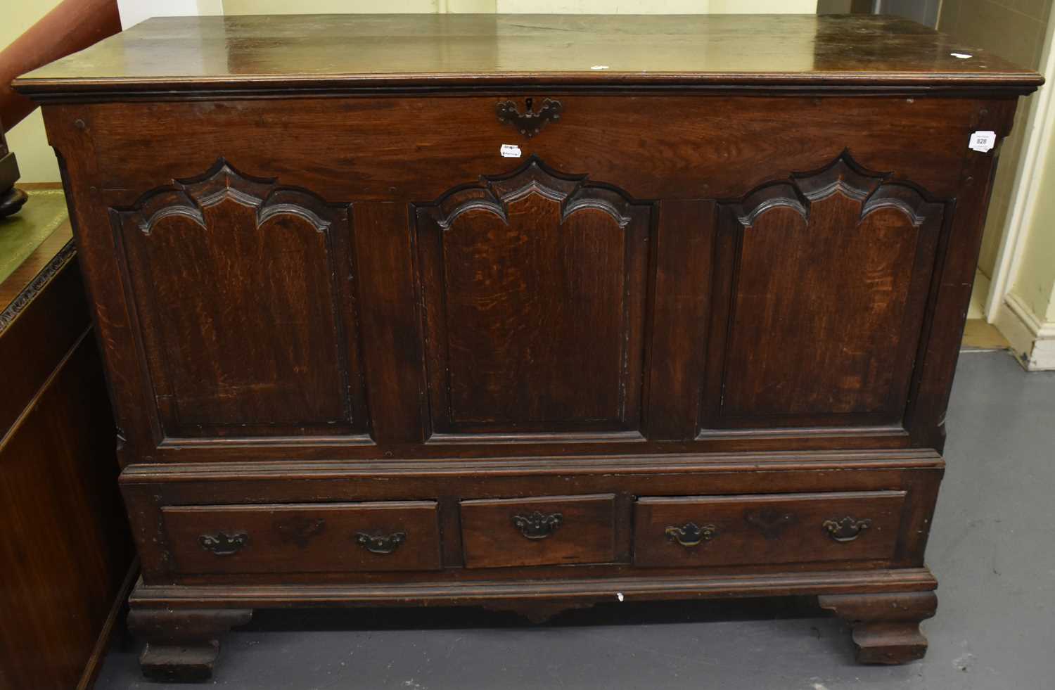 A Georgian oak mule chest, the hinged lid above a three-panel front and three base drawers, on - Image 2 of 2