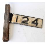RAILWAYANA; cast iron numberplate 124, 15 x 52cm.