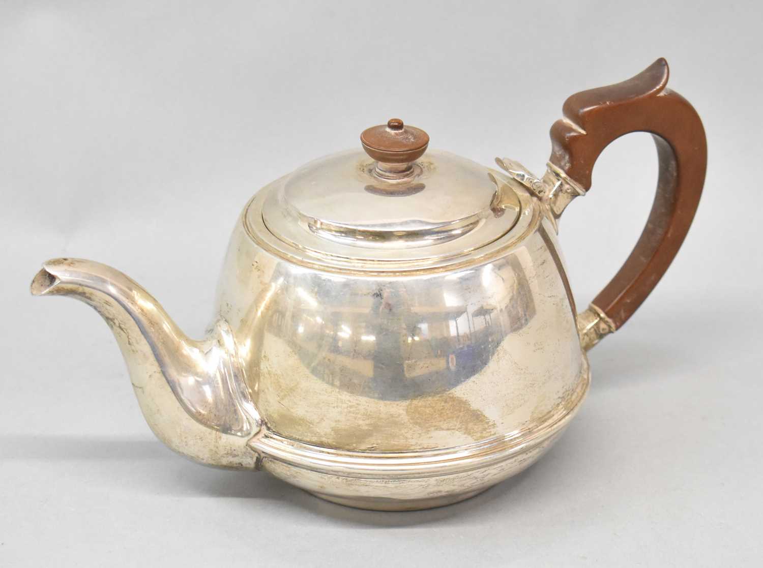 WILLIAM NEALE & SON LTD; a George V hallmarked silver teapot, Birmingham 1923, approx 12.47ozt/