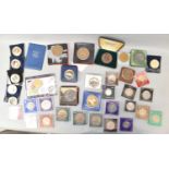 A collection of mainly commemorative coins and crowns, also various railway medallions, a boxed