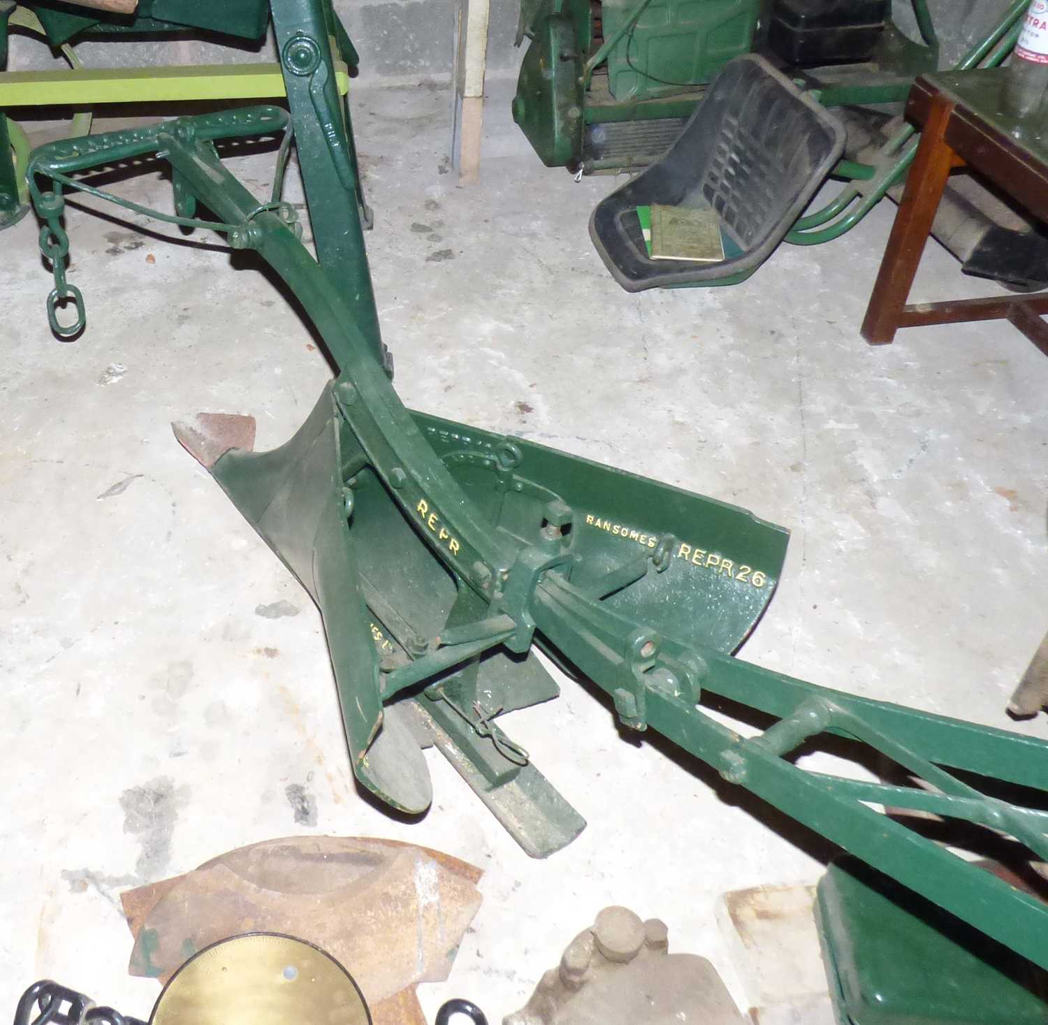 A vintage horse-drawn/machine pulled steel plough, marked Ransomes Repr 26, length 265cm. These - Image 4 of 4