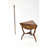 A 19th century mahogany inlaid drop-leaf table, to outswept supports, cross stretcher and castors,