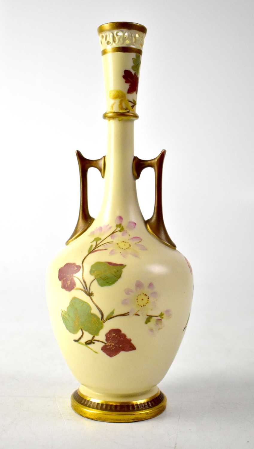 WORCESTER; a late 19th century blush ivory gilt-heightened twin-handled vase with reticulated