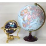 Two modern globes comprising a small agate and brass globe and stand, height approx. 27cm and a