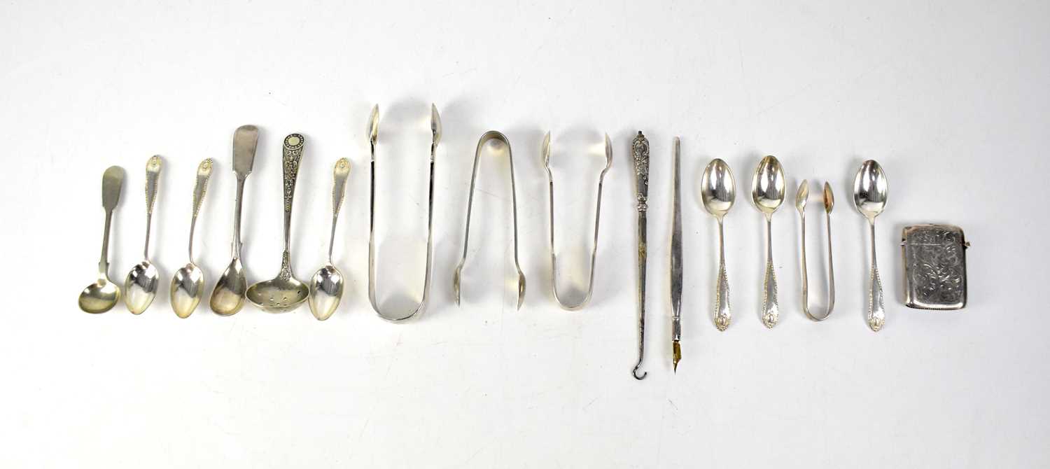 A quantity of hallmarked silver and white metal flatware to include coffee spoons, teaspoons,