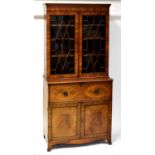 An Edwardian mahogany inlaid secrétaire bookcase, dentil moulded cornice above two astragal glazed