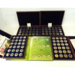 WINDSOR MINT; four cased sets, each containing twenty-four encapsulated photographic image coins,