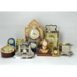 Approximately eleven various decorative and themed novelty clocks to include one modelled as Tower