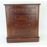 A mahogany tabletop miniature chest of two-over-three graduated drawers (to replicate a Scotch