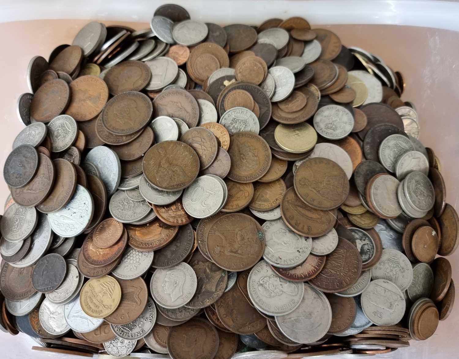 A large collection of British and world coins, mostly British pre-decimal and silver and half-silver