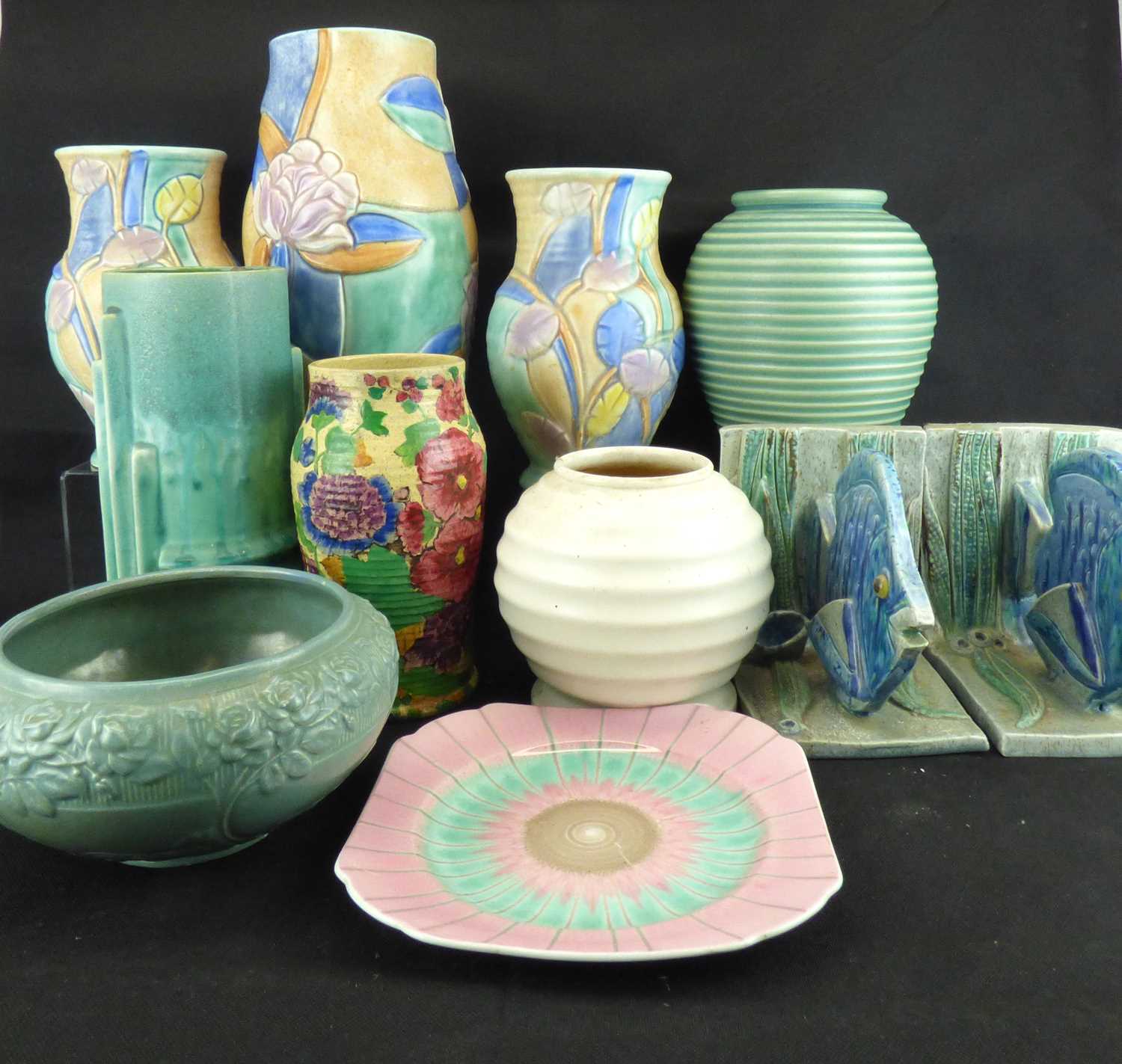 Various items of mostly Art Deco pottery to include three Beswick painted embossed floral vases, a