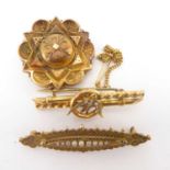 Three Victorian 9ct gold brooches comprising a double bar example with seed pearl clad swallow in
