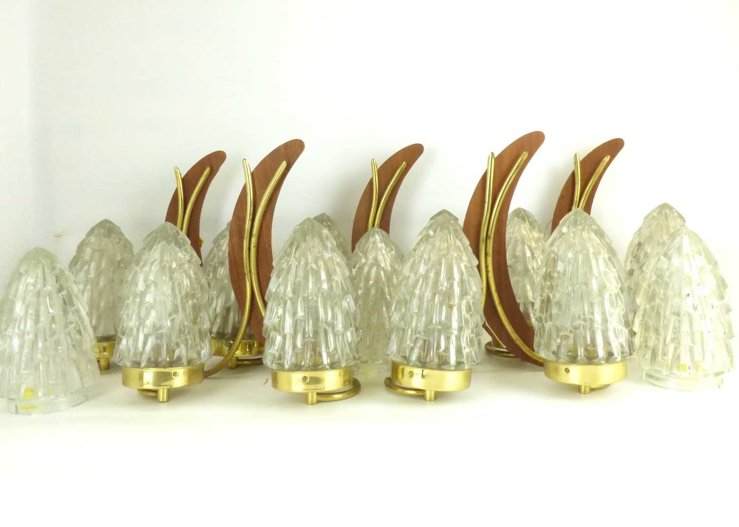 Five 1970s double wall lights with teak crescent back and brass tubular lamp mounts forming part - Image 2 of 4