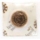 An Elizabeth II full sovereign 2012, new George and Dragon, still in the Royal Mint blister pack,
