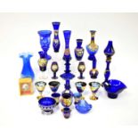 A quantity of blue glassware to include a Murano vase with applied floral decoration, matching and