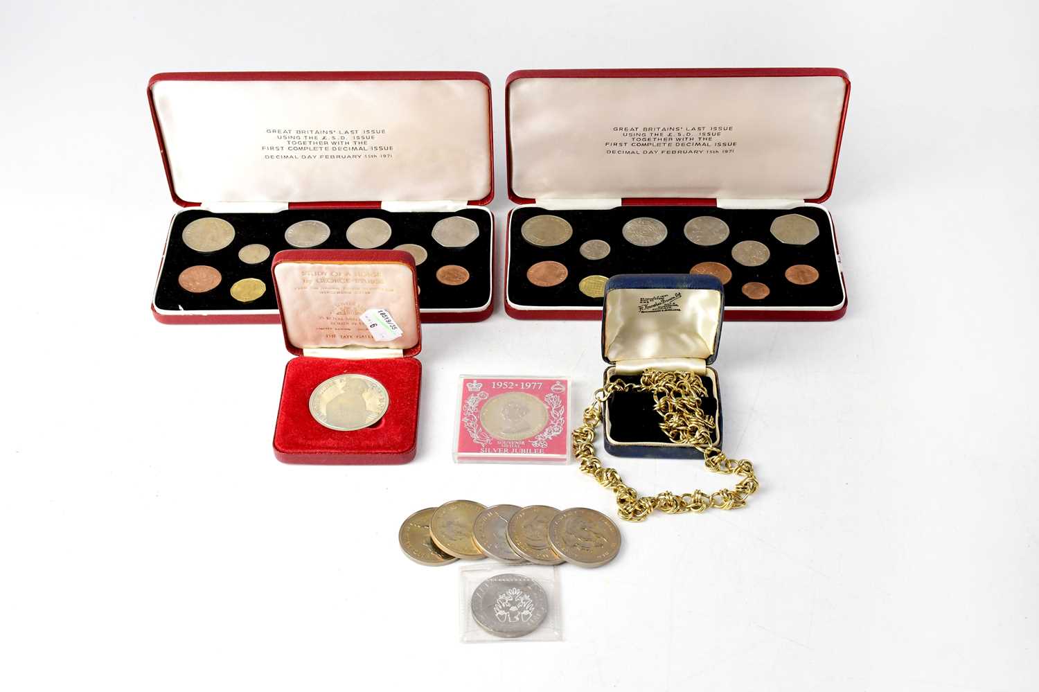 Two cased sets of mint Elizabeth II 'Great Britain's Last Issue Using the £.s.d', together with