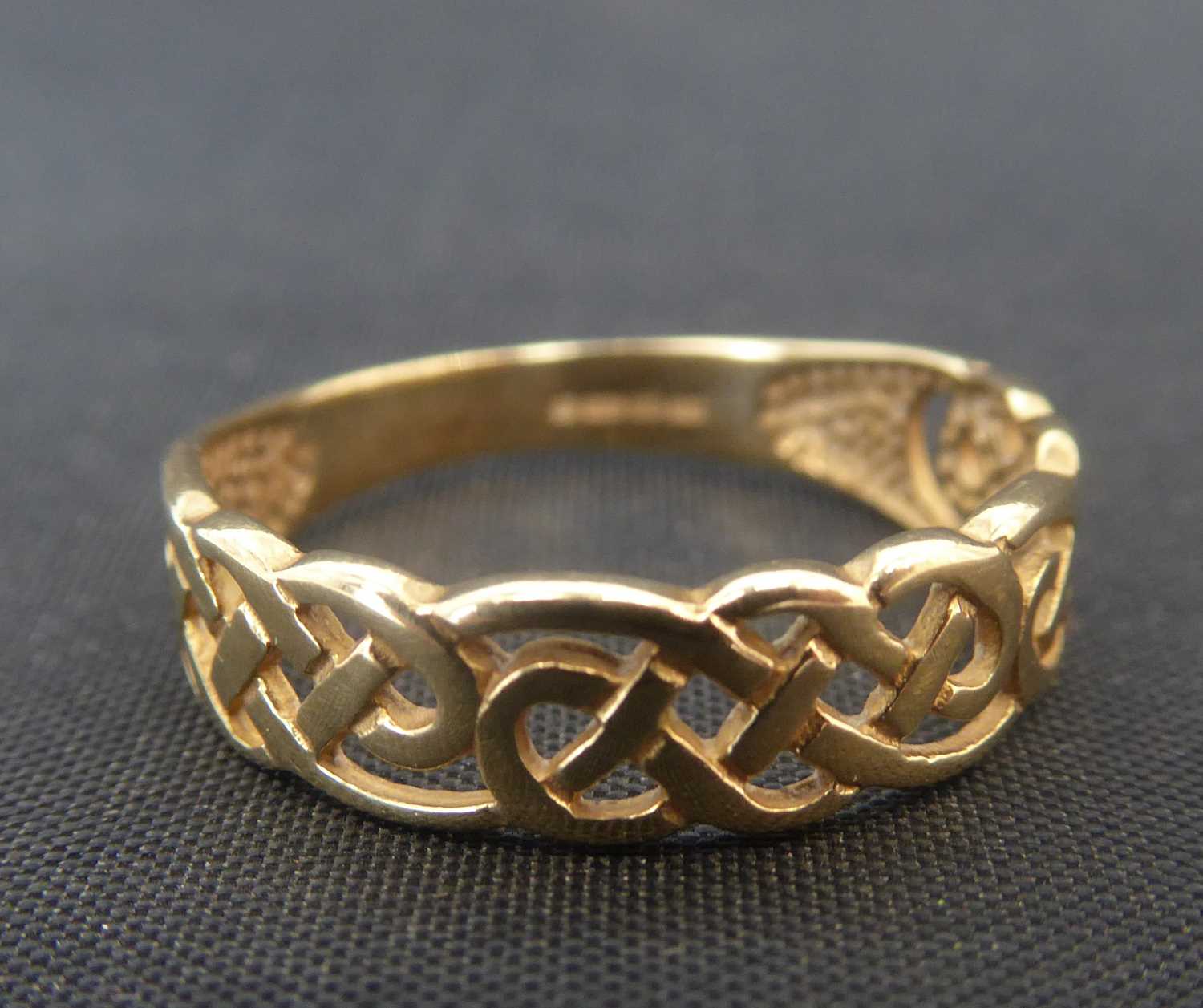 Three 9ct gold openwork Celtic design rings, two size N and the other size H, approx combined 3.4g. - Image 2 of 4