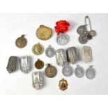 A quantity of religious themed medals and tokens to include white metal examples.