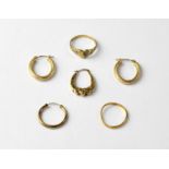 A pair of 9ct gold twist hoop earrings, three separate gold earrings and a 9ct gold ring with love