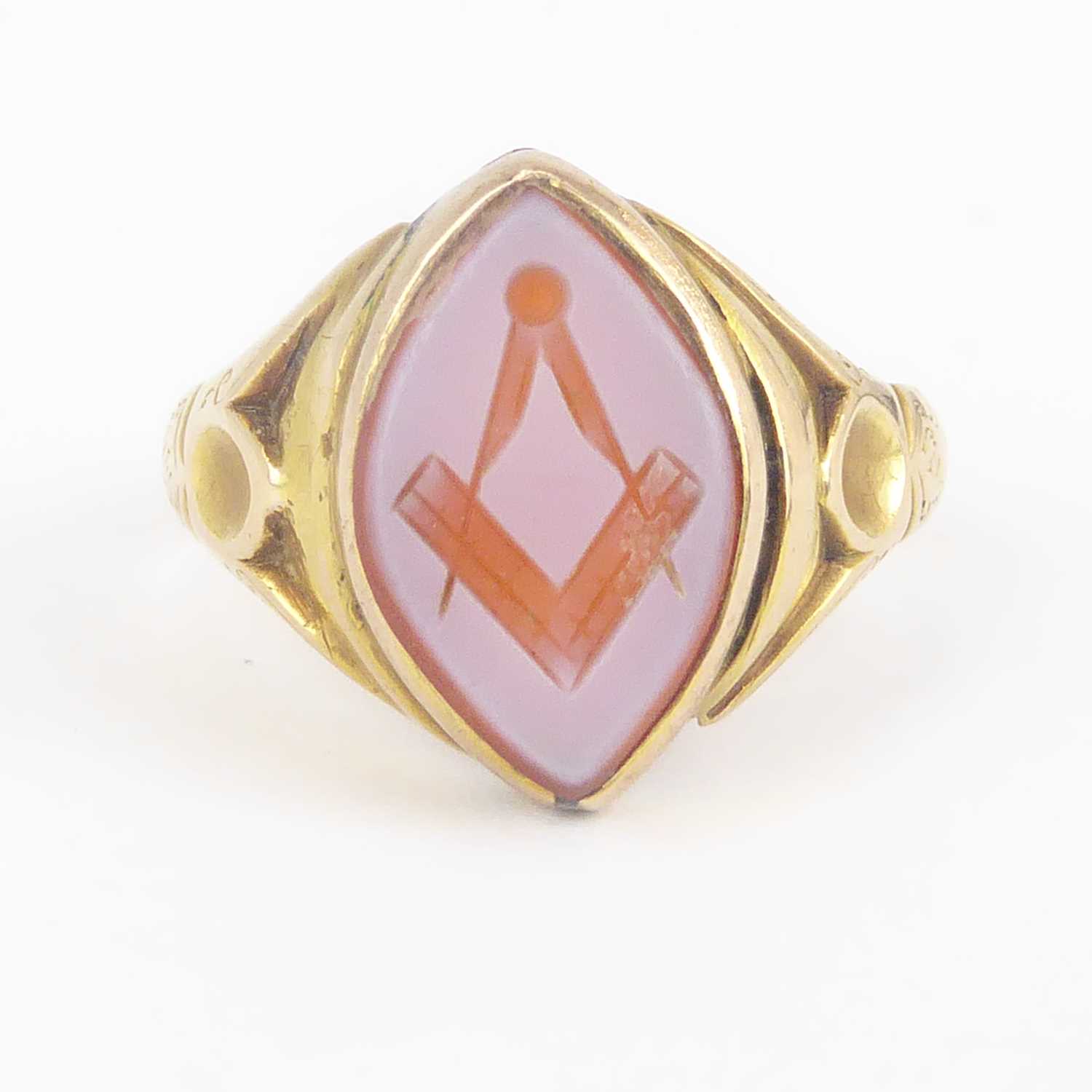 A vintage Masonic ring, the intaglio Masonic symbol to the top in a 15ct gold mount and shank,