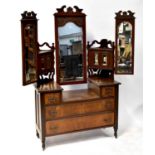 A Victorian walnut Duchess dressing chest with large hinged mirror flanked by a pair of angled