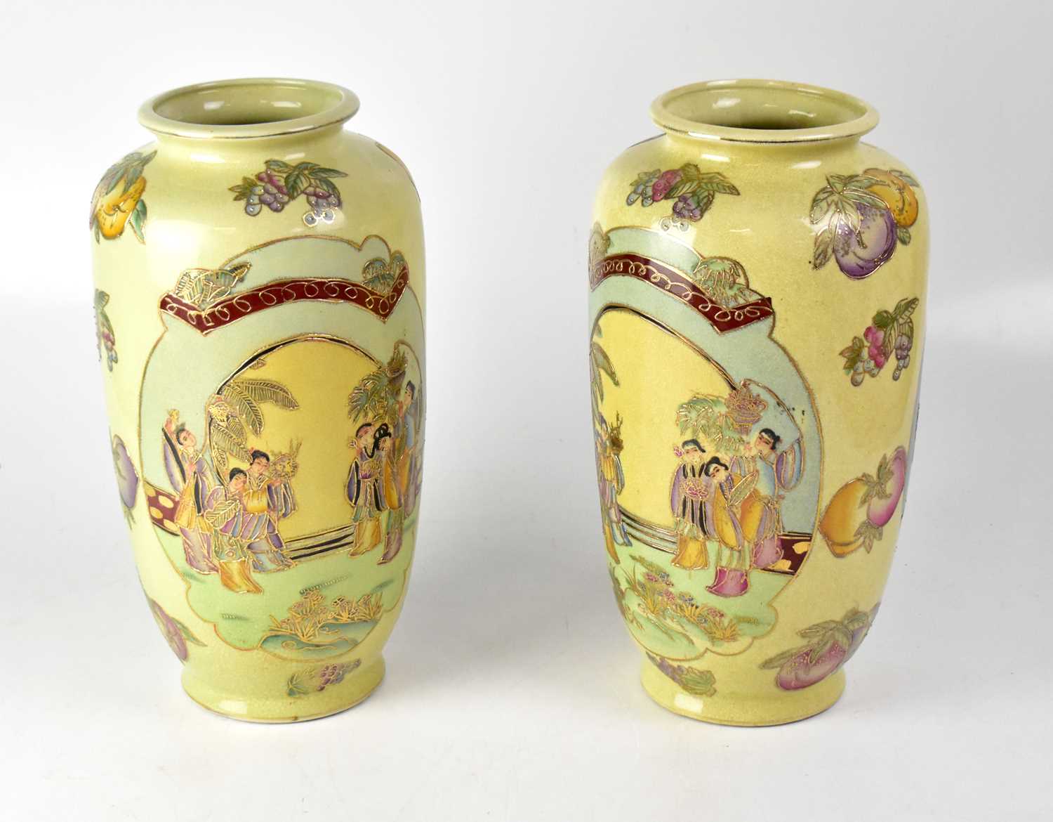 A pair of 20th century Japanese Satsuma-style baluster vases with fruit and floral panel decoration,